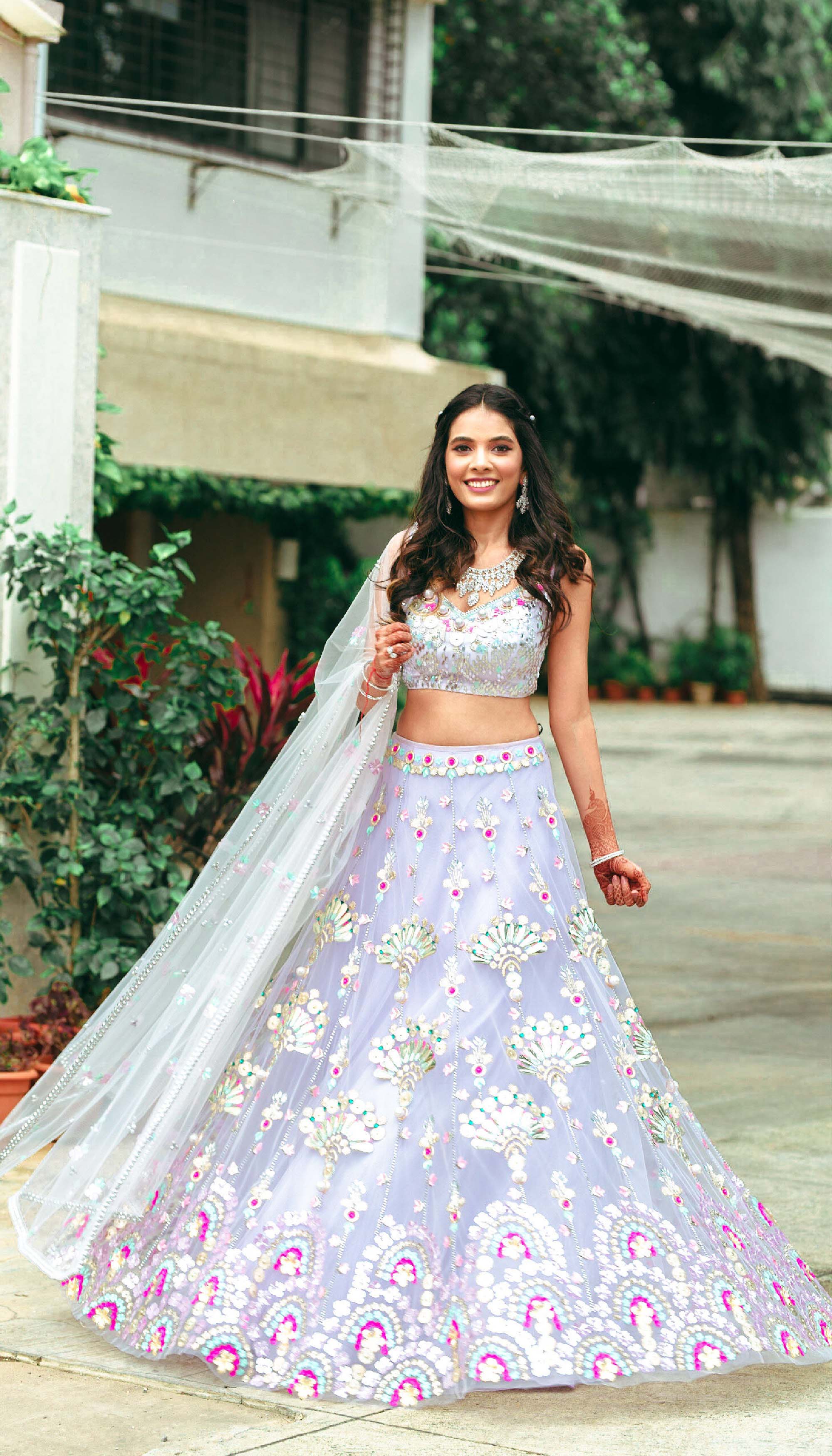 Photo of Light blue lehenga with a statement blouse.